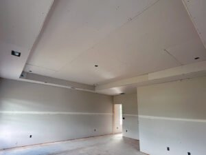 Sheetrock installed and begun finishing.